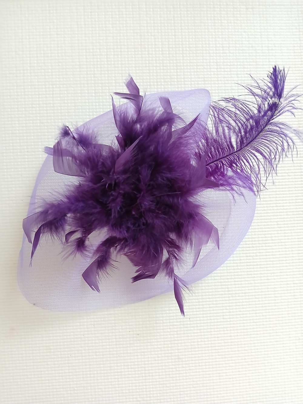 Women Purple  Feather Fascinator hat on net, universal fit, mint